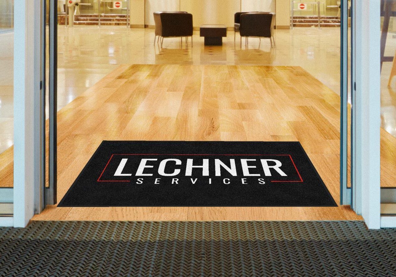 Lechner Services Logo Mat At An Entrance Door