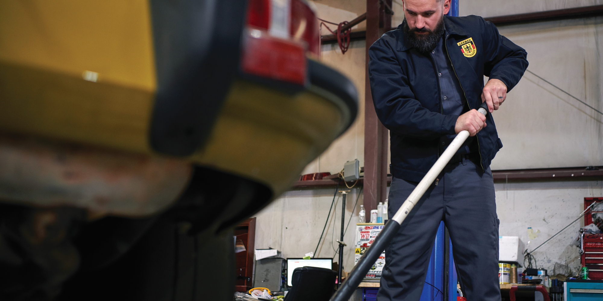 Mechanic wearing an automotive outwear uniform