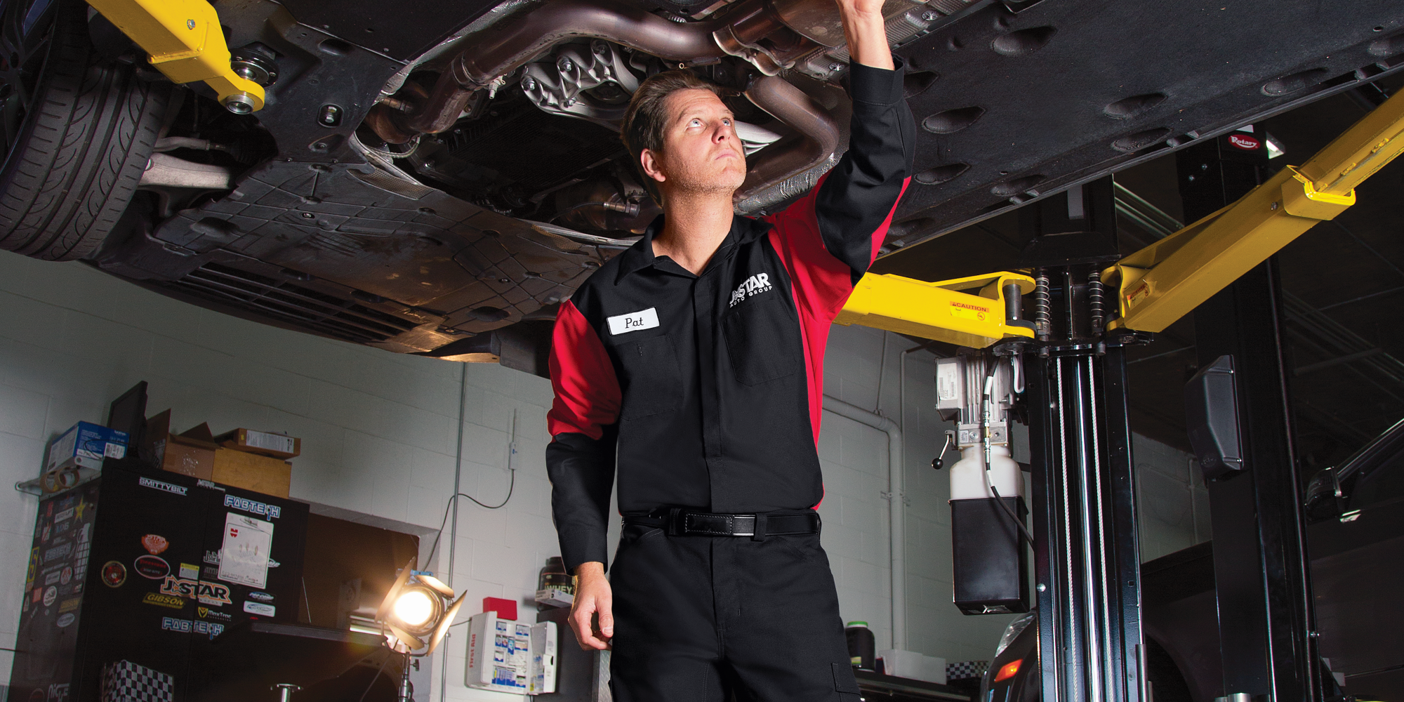 Automotive employee wearing a uniform